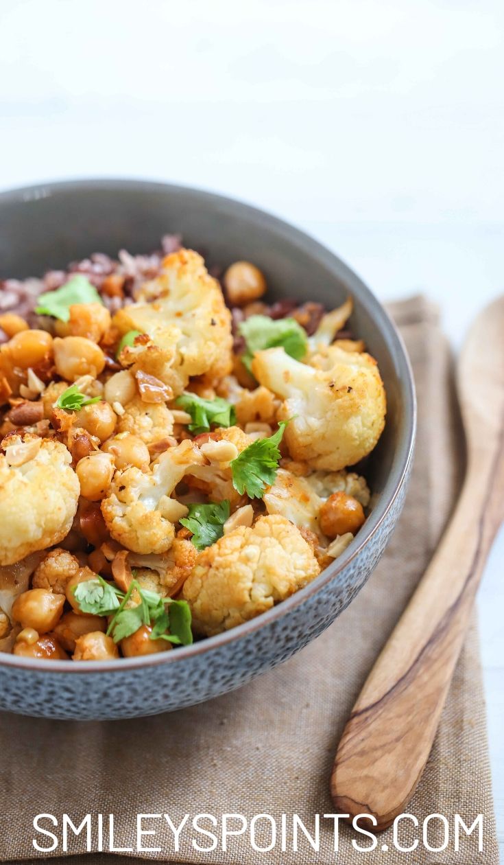 Cauliflower and chickepeas roasted in a stone bowl