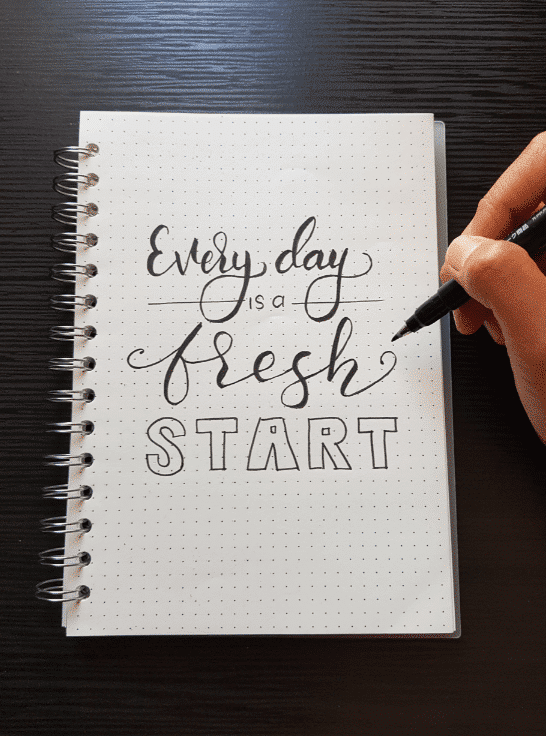 notebook that says: every day is a fresh start