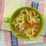 serving a ninja foodi-chicken-noodle-soup in the crock pot
