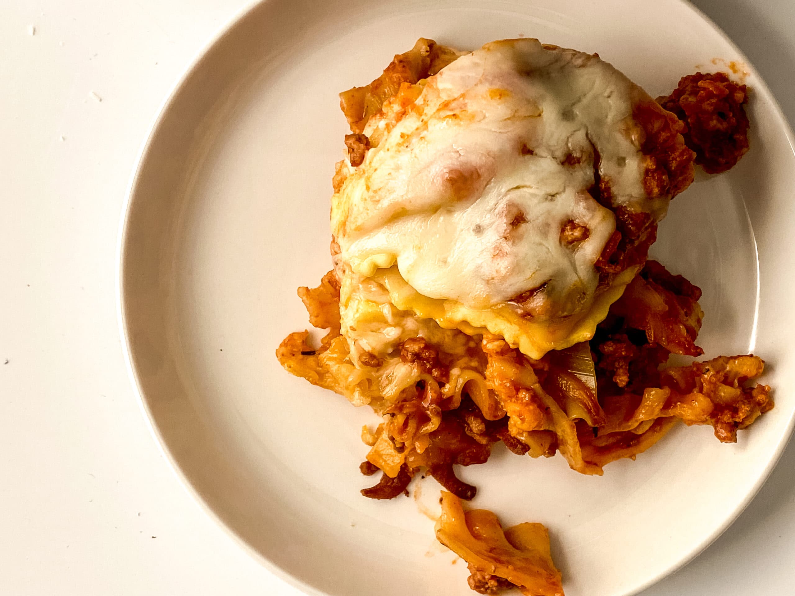 1 serving of lasagna on a white plate