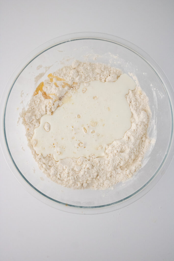 mixed all-purpose flour. baking powder, grated frozen butter and buttermilk