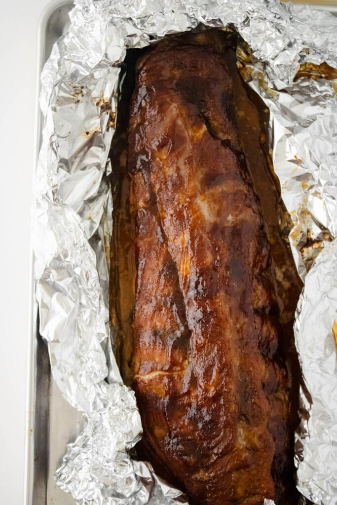 oven baked baby back rib in a aluminium foil